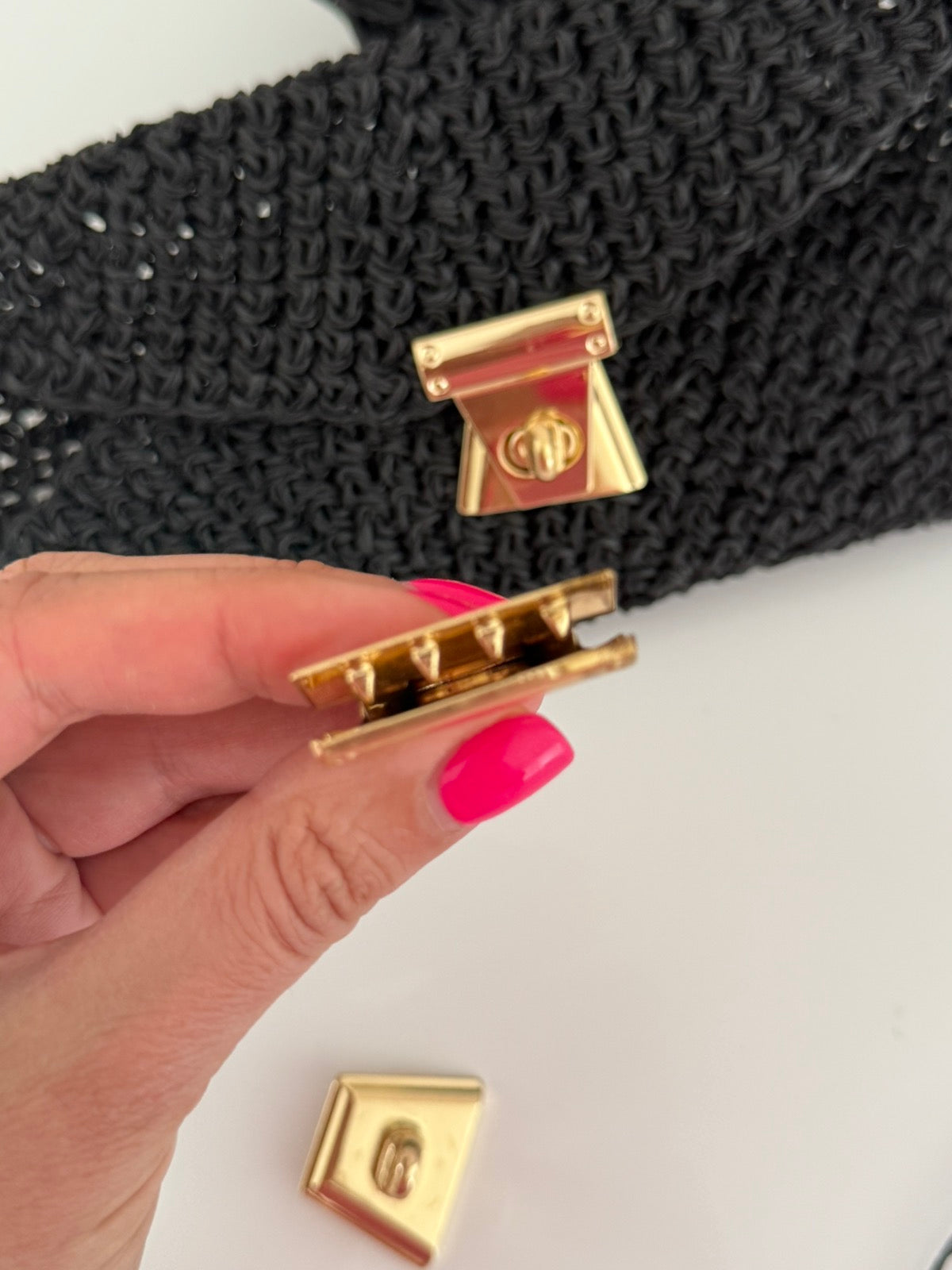 Hand-held clasp