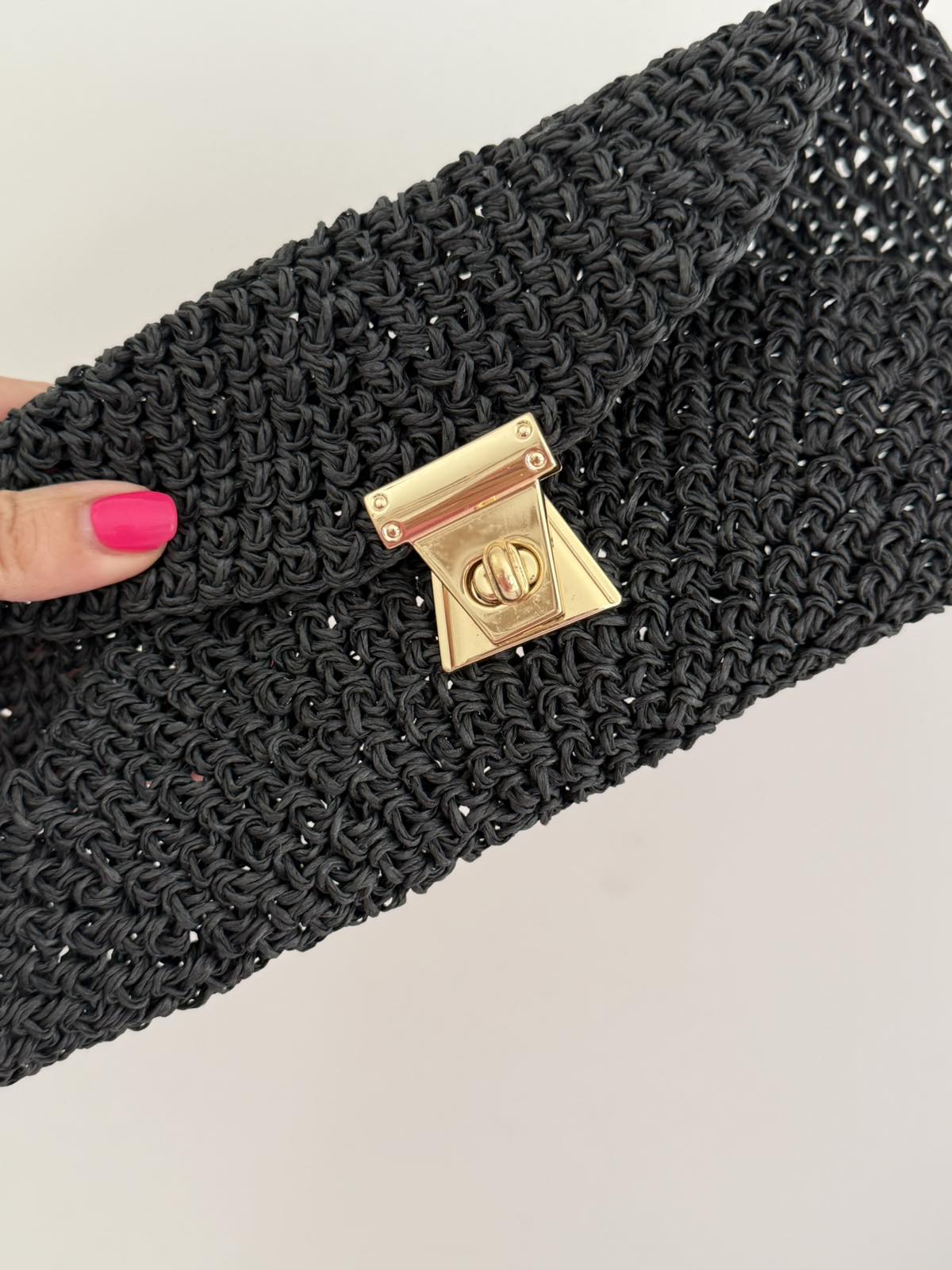 Hand-held clasp