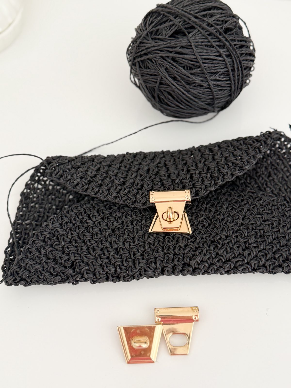 Hand-held clasp
