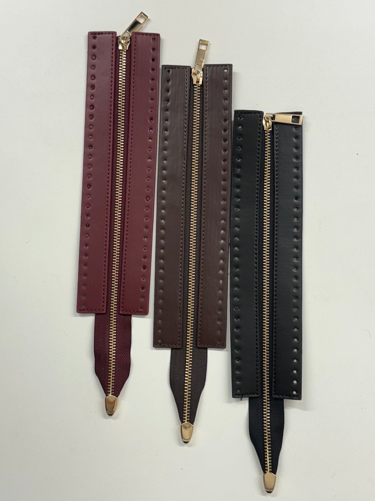 Užtrauktukai nertom rankinėm delninėm 3 spalvos